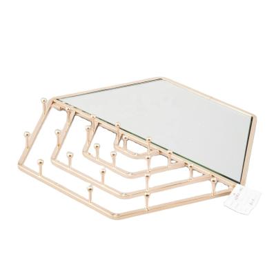 China Gold Minimalist Luxury Vanity Designs Decorative Metal Wall Mirror For Bedroom Jewelry Store Accessories Necklace Holder for sale