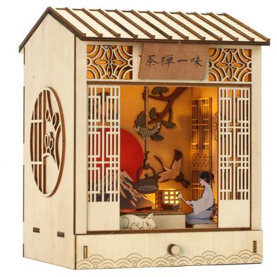 China Toy Hot Selling Zen Tea Battery Operated Blindly Assembled Wooden Book Stand Diorama Educational Toys Shelf Inserts Book Nook for sale