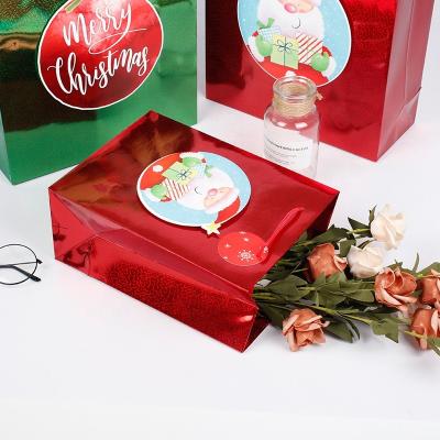 China Top Selling Colorful Printing 3D Tip Recyclable On Christmas Gift Bags Paper With Holographic Foil Lamination for sale