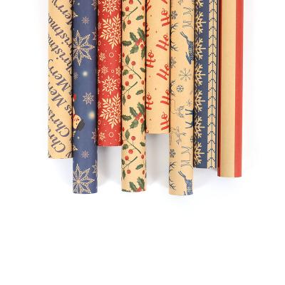 China Christmas Theme Snowflake Design Wrapping Paper Manufacturers Antirust Wholesale Wrapping Paper Roll for sale