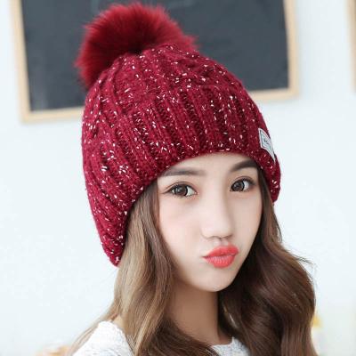 China JOINT Top Selling Amazon Trending Products Beanie Hat With Pom Pom High Quality Fashion Knitted Wool Beanies For Women Winter for sale