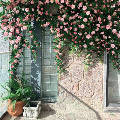 China Festival Manufacturers Wholesale Artificial Rose Vine Faux Flower Cane Winding Decoration for Wedding Decor for sale