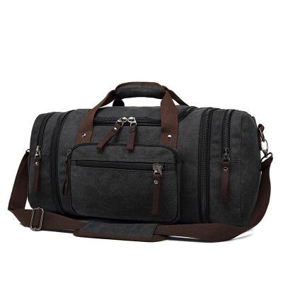 China Custom Large Capacity Fashion Men Women Waxed Waterproof Canvas Weekender Travel Duffel Bag for sale