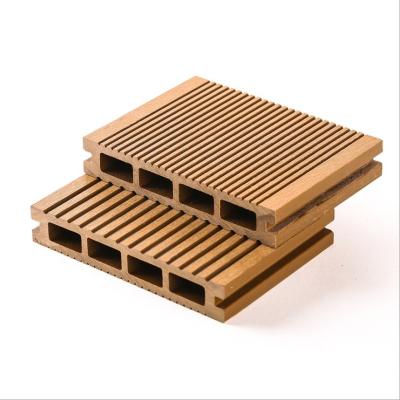 China Environmental Friendly New Technology Composite Decking Long Life Time 3d Teak Embossed Exterior Hollow Decking Decking for sale