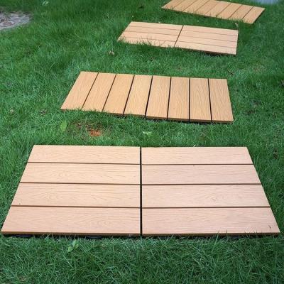 China YUJIE DIY wood plastic composite flooring environmental friendly outdoor wpc patio tiles decking on sale for sale