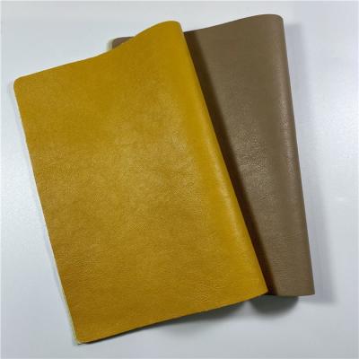 China YE286-102-11 Abrasion-Resistant Eco-Friendly Faux PU Leather Garment Leather 0.80 Mm Thickness With TC Backing for sale