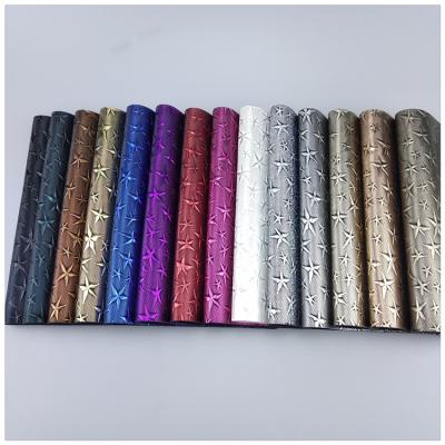 China Abrasion-Resistant Embossed Star Pattern PU Leather For Lady Bag Shoes Wallet for sale