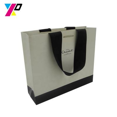 China Fashion Recyclable Wholesale Custom Logo Pattern Printing Gift Luxury Shopping Paper Bag With Ribbon Handle for sale