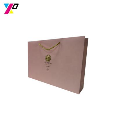 China Good quality custom made luxury commercial shopping logo recycled paper shopping bag recyclable in pink red color for sale