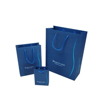 China Excellent Custom Logo High Quality Recyclable Foldable Kraft Paper Or White Shopping Paper Bags With Handle for sale