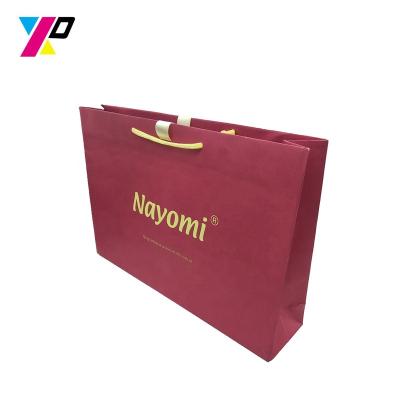 China Recycled Materials Wholesale OEM Custom Design Colorful Luxury Kraft Paper Gift Paper Bag For Shopping With Handle for sale