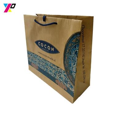 China Wholesale Fashion Custom Logo Recyclable Recycle Printing Kraft Paper Bag With Handle for sale