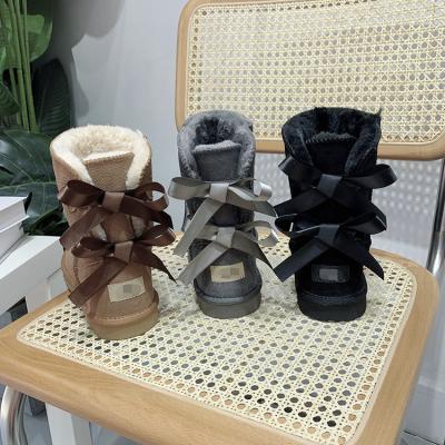 China Fashion Trend Dropshipping Custom Colorful Logo Women Flat Snow Boots With Fur Back Bowknot Winter Warm Shoes Plus Size for sale