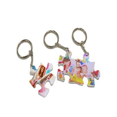 China 2021 Ladies Bag Decoration Key Chain 03 Key Chain Customized Environmentally Friendly Polymer Plastic Puzzle Sublimation for sale