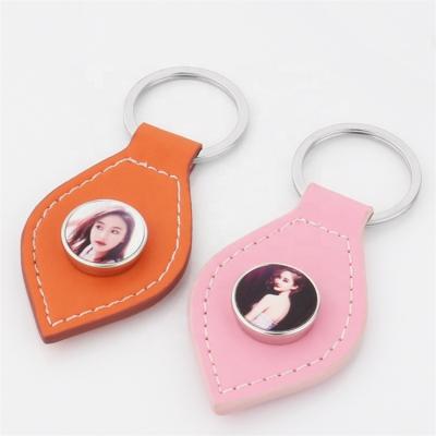 China Zinc Alloy +Leather Guaranteed Unique Quality Sublimation Blank Metal Snap Button Key Chain Leather Leaf Shape for sale