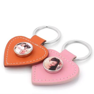 China Zinc Alloy +Leather Guaranteed Unique Quality Sublimation Blank Metal Snap Button Leather Key Chain Heart Shape for sale