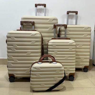 China Durable Wholesale Hardside Luggage valise de voyage 5 pcs Luggage Set Suit Case Bags Trolley Travel ABS Suitcase with Cosmetic Bag for sale