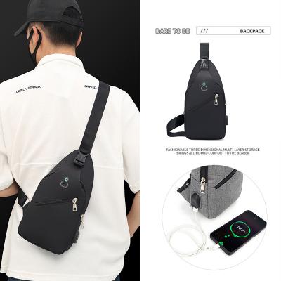 China With USB Men Sling Bag with Headphone Hole Daypack Crossbody Shoulder Sling Backpack USB Mobile Phone Chest Bag for sale