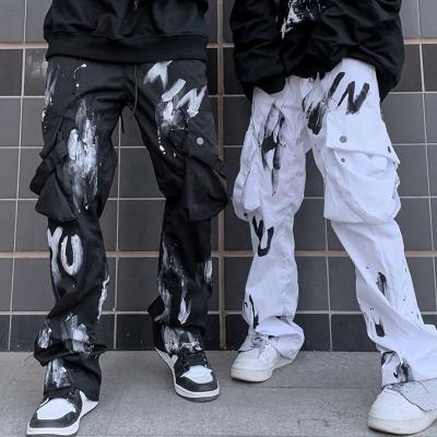 China QUICK DRY Stretch Graffiti Print Multi-pocket Cargo Pants Men's Black And White Straight-Leg Casual Loose Pants for sale