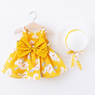 China Wholesale Washable Bow Decoration Suspender Skirt Baby Yellow Floral Print Elegant Dress for sale