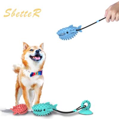 China Interactive SPT TPR Suction Cup Tug Toy Teeth Cleaning Push Toy Pet Leak Viable Ball Dog Food Chew Toy for sale