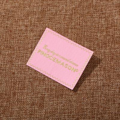 China Viable sell a large number of customizable soft clothing fabric labels, PVC clothing brand labels for sale