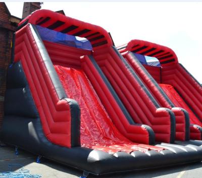 China Hot Selling Red And Black PVC Inflatable Dry Slide For Party Use for sale