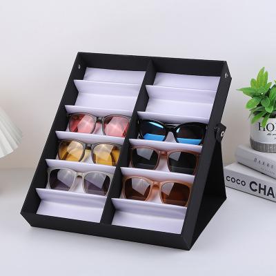 China Modern Durable Storage Stand Leather Glasses Frame Tray 12 Slots Glasses Tray Eyeglass Organizer Box Sunglasses Display Case for sale