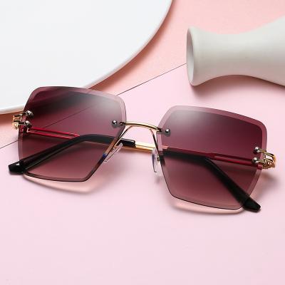 China Fashion Sunglasses New Products Rimless Frameless Uv400 Gradient Big Frame Shades Sunglasses for sale