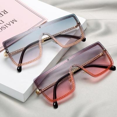 China Lady Eyewear One Piece Sunglasses Rimless Chain Women's Photochromic Frameless Oversized Square Trendy Vintage Sun Glasses 2021 Fashion for sale