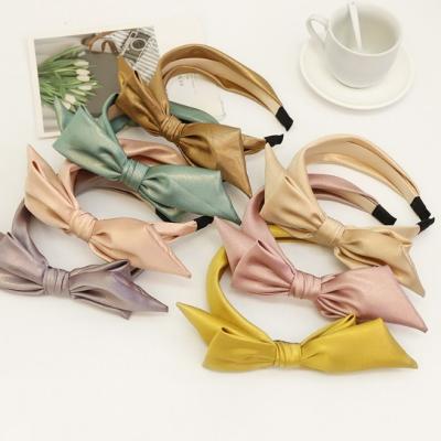 China New fashion simple concise women's hair band headband silk fabric edge headband bright wide hair sling side bow for ladies headband for sale