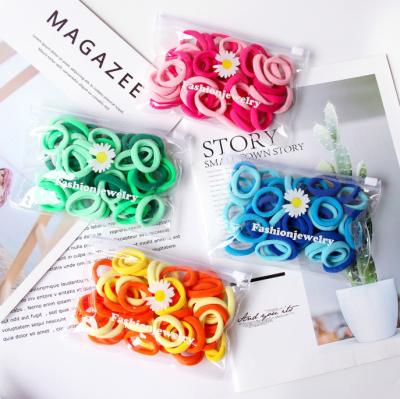 China Candy Colored Daisy Small Bag Elastic Hair Bands Towel Children's Hair Circle Elastic Band for sale