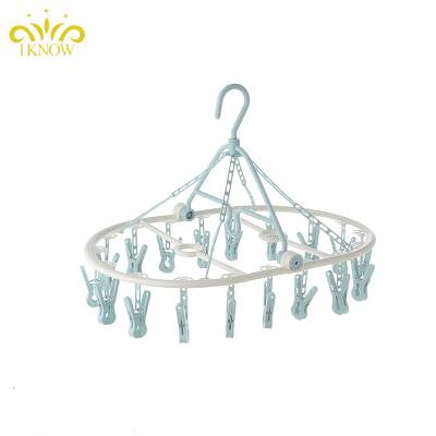 China Modern Household Travel Use Plastic Hanger Folding 18 Clips Hooks Hanger Clothing for sale