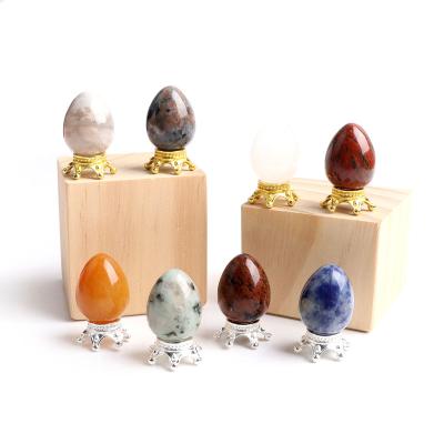 China China Natural Polished Small Gemstone Quartz Yoni Eggs With Mini Crown Healing Base For Gifts for sale