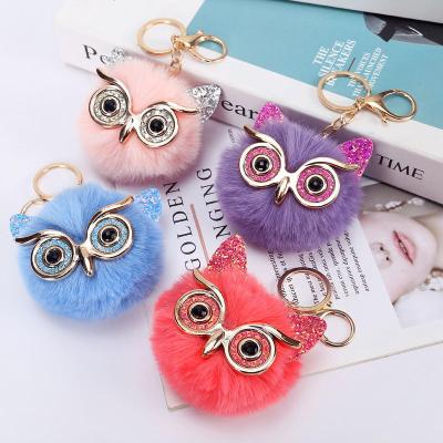 China 2022 Large Eye Gold Powder Sequin Hair Bunny Ball Pompom Owl Souvenir Gifts Promotion Key Chain Lady Pendant Bag for sale