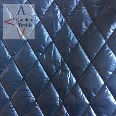 China Downproof square box pattern double sided waterproof quilted nylon ripstop fabric with polyester filling for sale