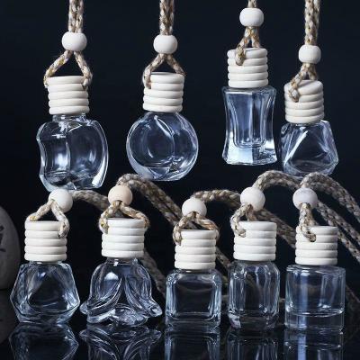 China Personal Care Factory Produced Wholesale Colorful Aroma Luxury Car Pendant Reed Diffuser Glass Bottle for sale