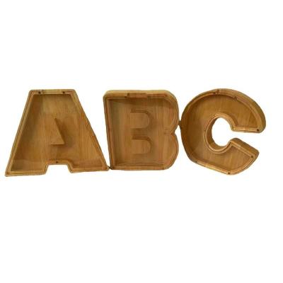 China Custom Personalized Piggy Wooden Letter Coin Bank Text Engraved Piggy Bank for sale