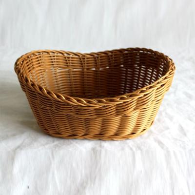 China Sustainable Cheap Wicker Fashion Plastic Rattan Fruit Display Basket for sale