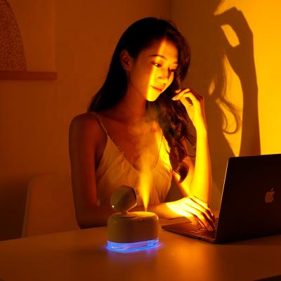 China Modern Ready To Ship USB Rechargeable Large Battery Rotate Sunset Projection Night Light Mini Air Humidifier With Sunset Lamp for sale