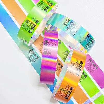 China Pulseras de papel de colores impermeables Impresión de logotipos sintéticos personalizados en venta