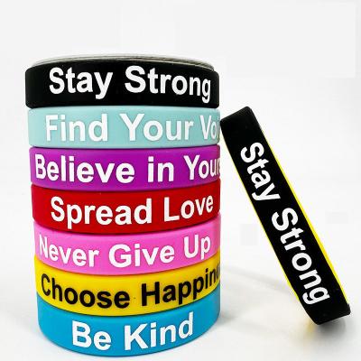 China Factory Slogan Watchword Printed Silicone Bracelets Custom Soccer Ball Game Festival Souvenir Gift Silicone Wrist Bands for sale