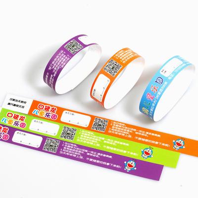 China Custom Event PP Synthetic Paper Wristband With Full Color Printed Waterproof Sweat Resistant Admission Wrist Bands for sale