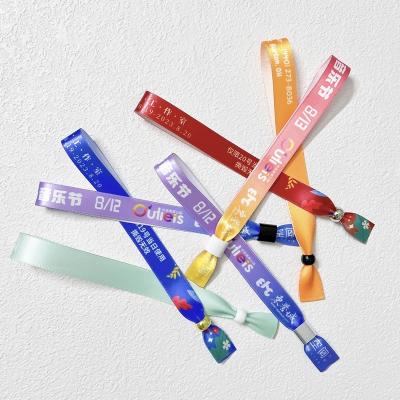 China Supplier Woven Cloth Wristbands Festival Concert Promotion Event Ribbon Fabric With Various Designs Quick Delivery for sale