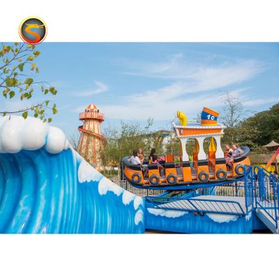 China Amazing FRP+steel Kids Fun Rides Tug Slide Boat Attractive Surfing Boat Rocking Rides For Sale for sale