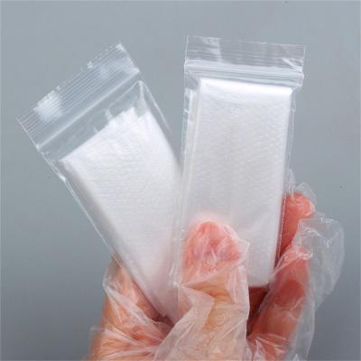 China custom glove package disposable pe oil proof pe individually wrapped gloves for food restaurant grocery store for sale