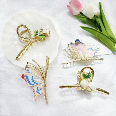 China Hair Scratching Chinese Style Fairy Grab Clip Big Camellia Pretty Exquisite Metal Butterfly Hair Claw Clip for sale