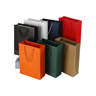 China Small Recyclable Luxury Christmas Gift Bags White Paper Bags With Handles for sale