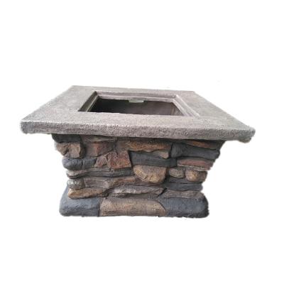 China Lifestyle Fiber Stone Finished Outdoor Wood Fire Pit Stove With Metal Iron Pot for sale