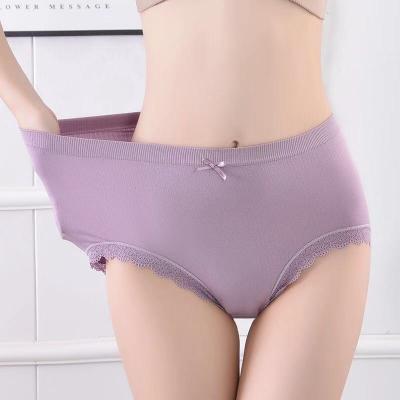 China Antibacterial Women's Seamless Solid Color Mid Waist Hippie Plus Size Panties for sale